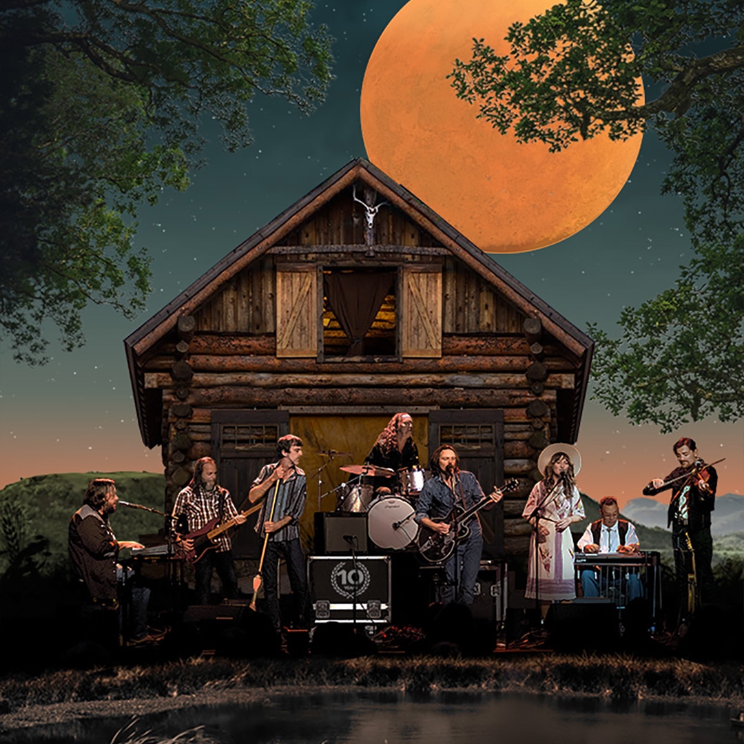 Harvest hero image A group of folk musicians stand in an illustrated retro landscape