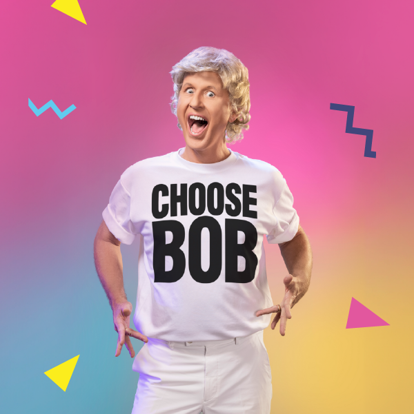 Image: supplied Bob Downe on a colourful 80s back ground wearing a Choose Bob t-shirt