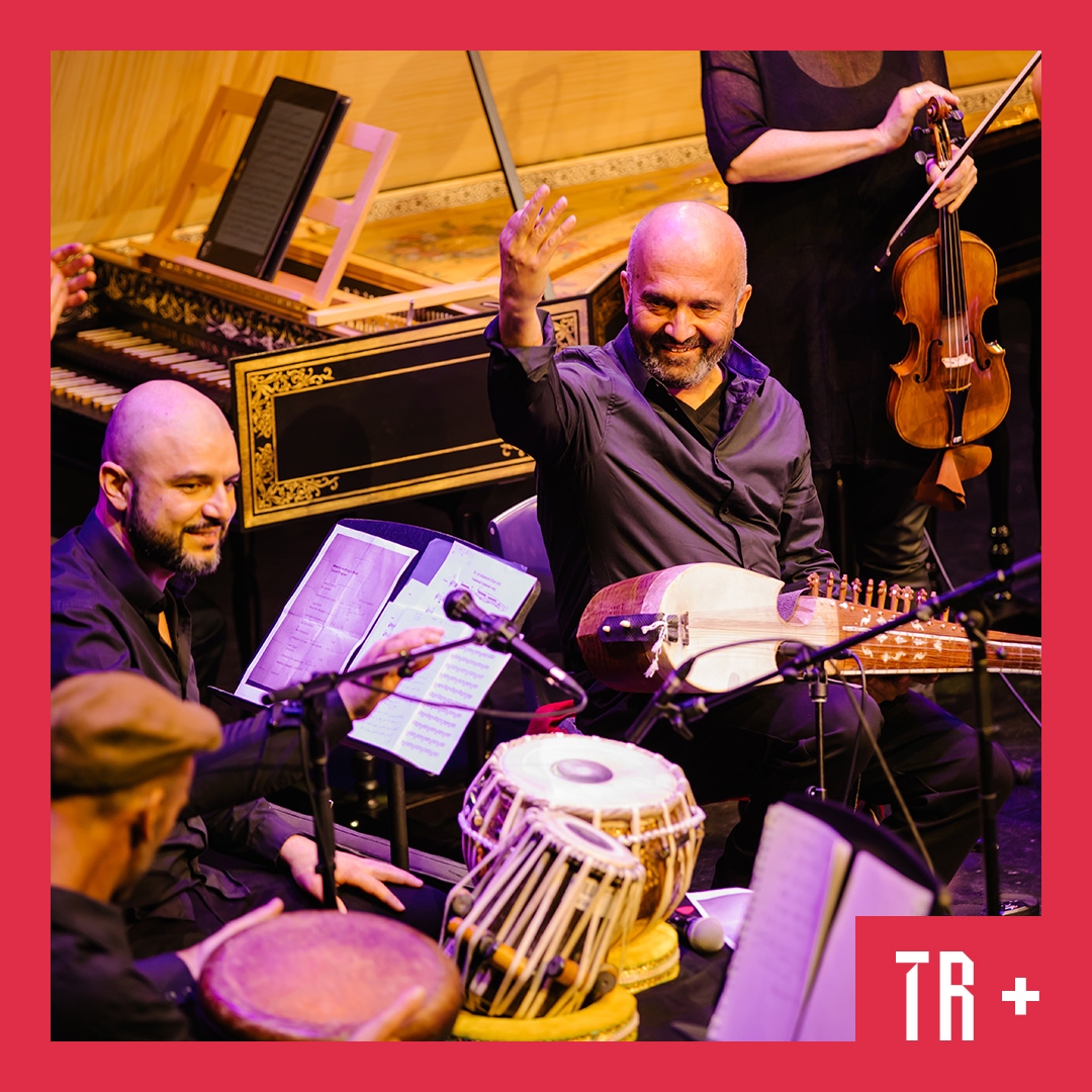 Image: Moorilla Gallery A close up image of Middle Eastern musicians on a stage surrounded by instruments