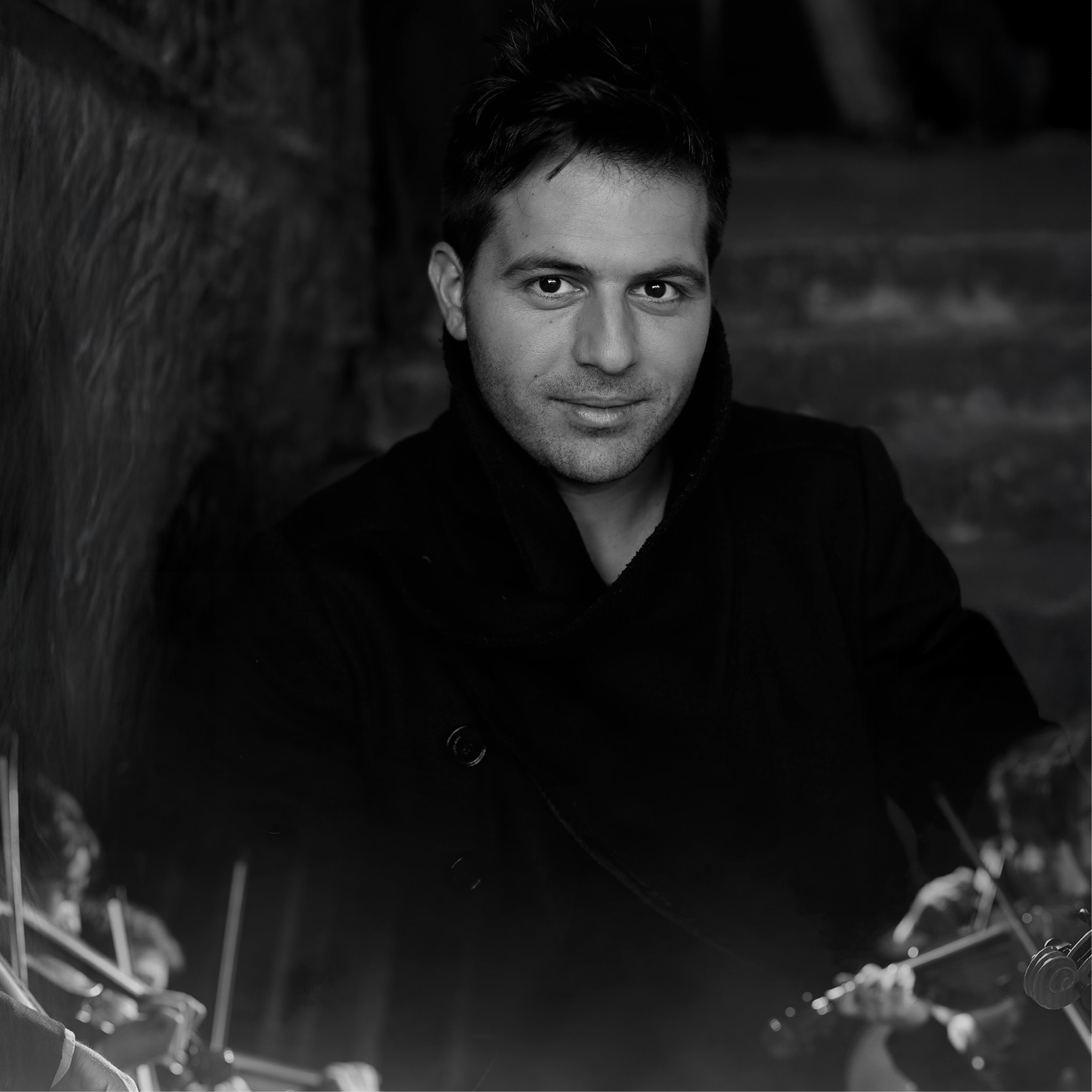 A black and white portrait of tenor singer Mark Vincent