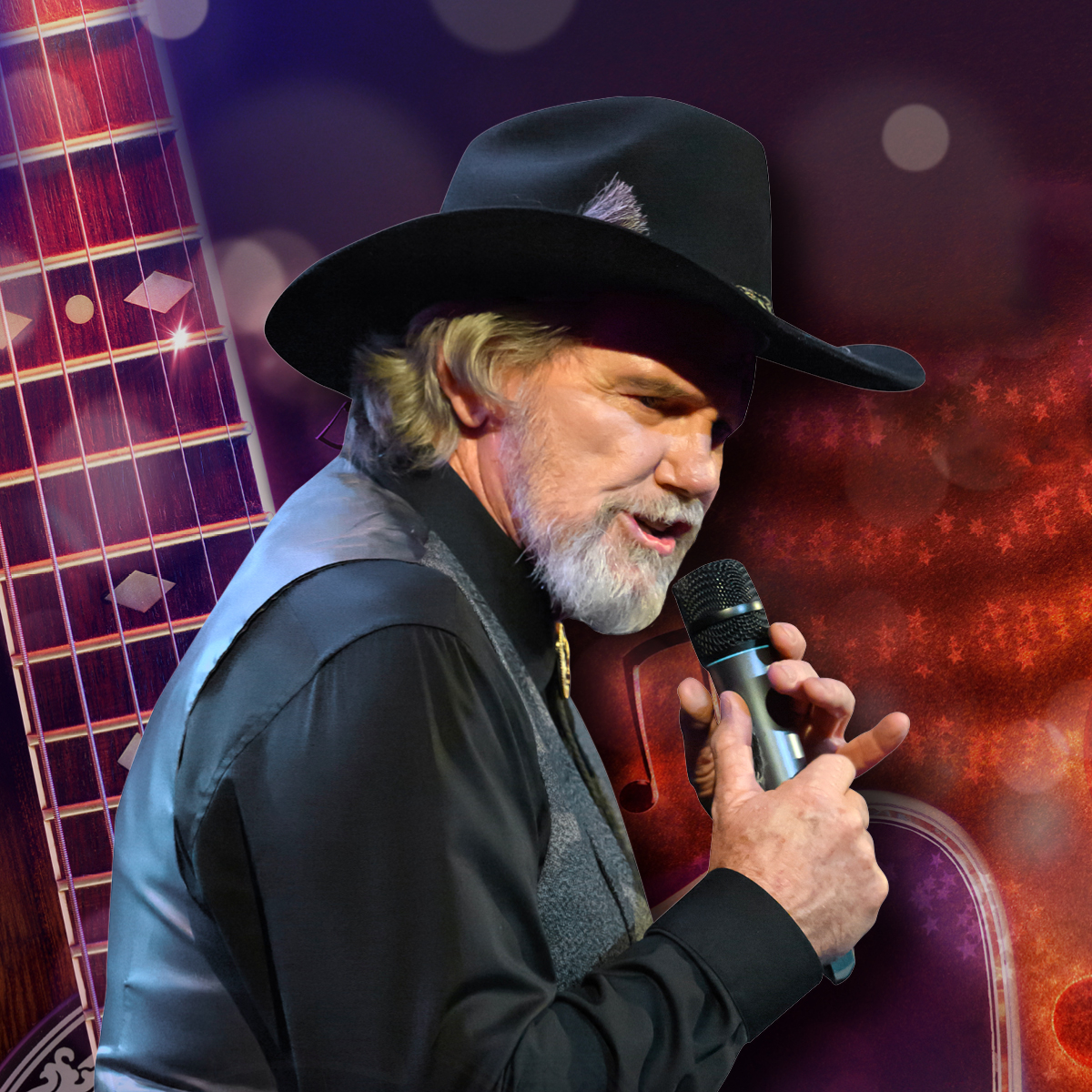 A musician holds a mic, he is wearing black, with a black vest and slouch hat