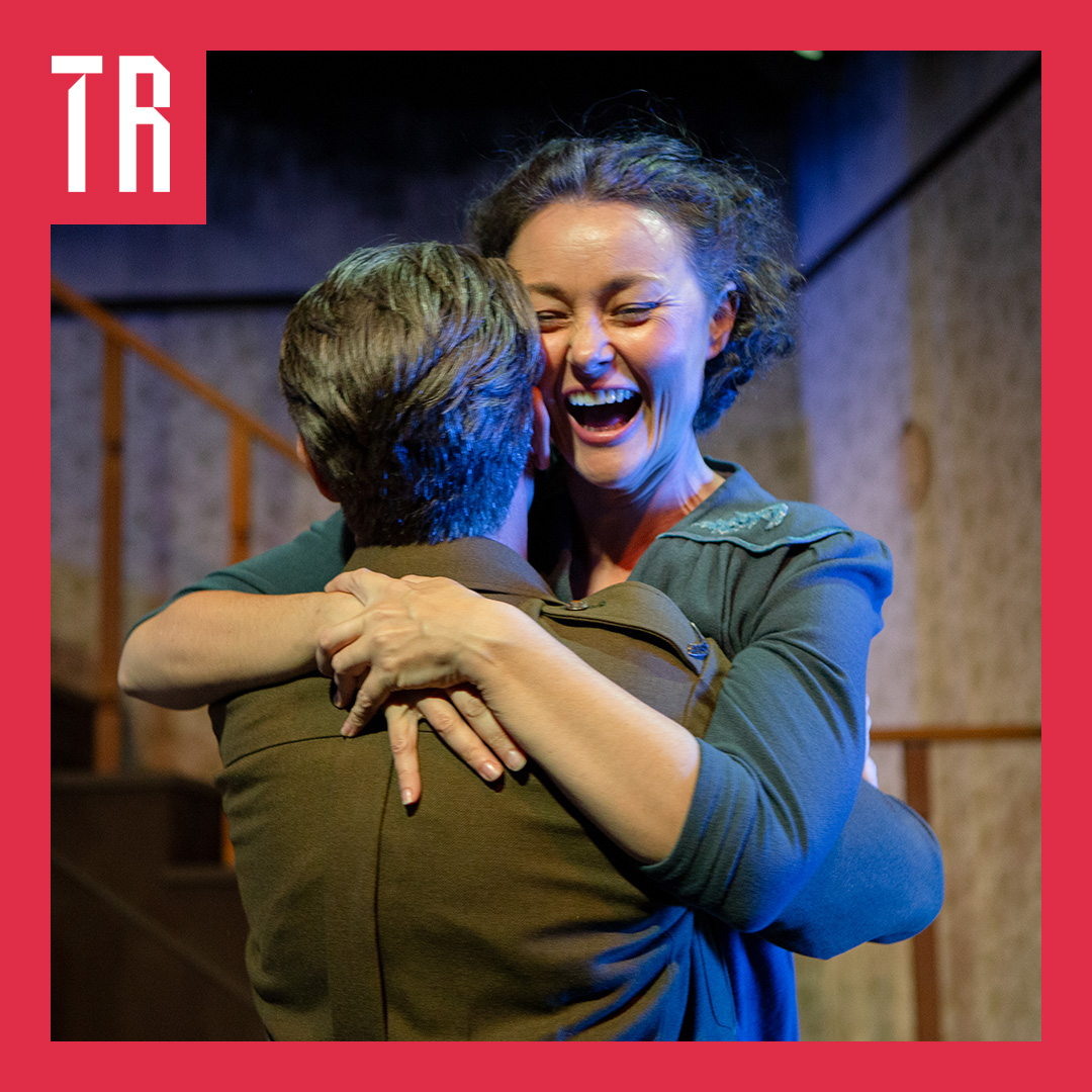 A woman is overjoyed embracing a make soldier, recently returned from WW2