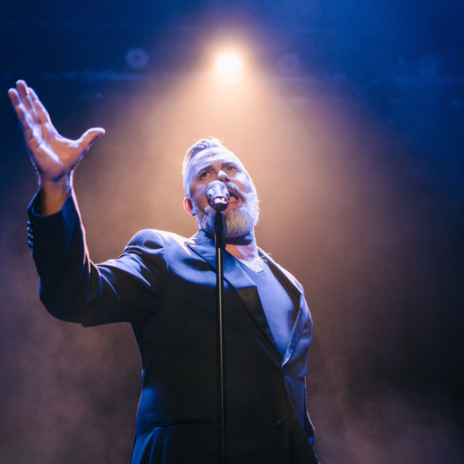 Dale Burridge Dale Burridge sings with hand outstreched