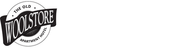 The Old Woolstore Apartment Hotel logo A black and white text based logo